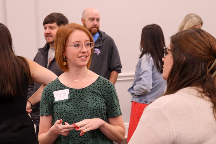 Teachers visiting with each other
